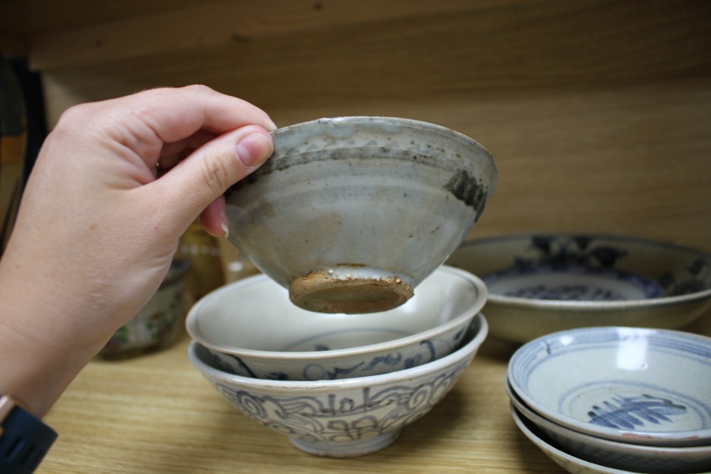 A group of Chinese and Sawankhalok blue and white ceramic bowls and dishes (10)